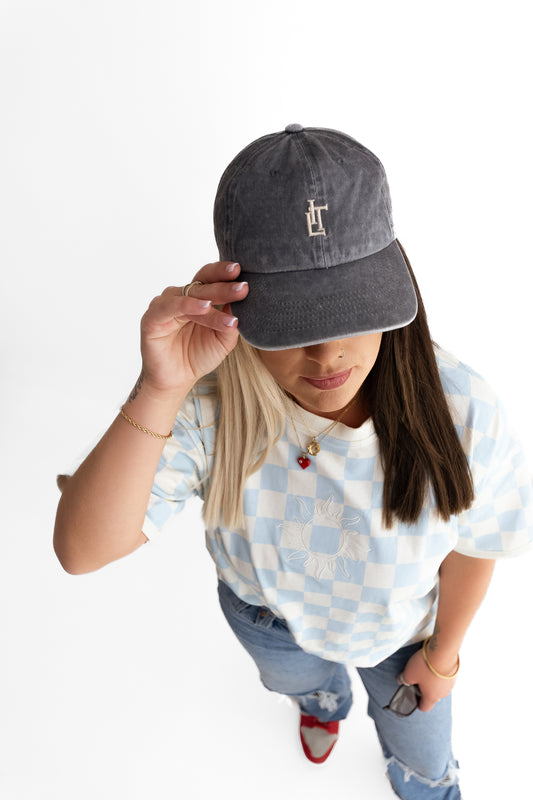 grey baseball cap on model 