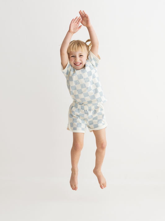 checked blue shorts and t-shirt 